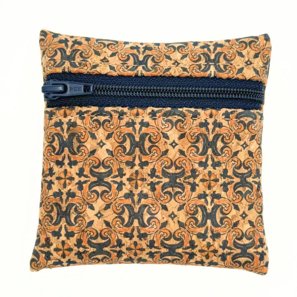 Front of gold and navy fleur-de-lis coin purse with navy zipper by Texas Cork Company