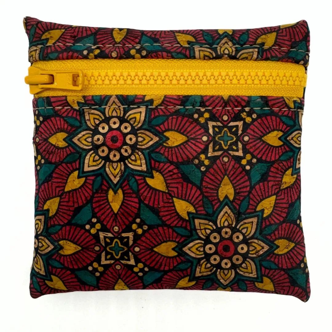Front of red floral coin purse with yellow zipper by Texas Cork Company