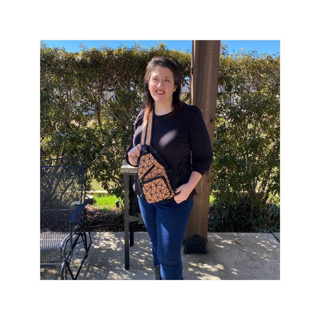 Woman wearing the Geometric Convertible Cork Backpack Sling Crossover as a chest bag