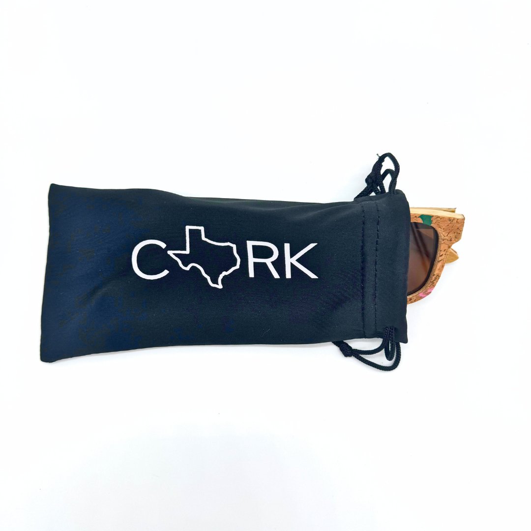 Eco-friendly cork and bamboo polarized floating sunglasses with stylish soft bag by Texas Cork Company