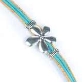 Closeup of cork bracelet with flower pendant