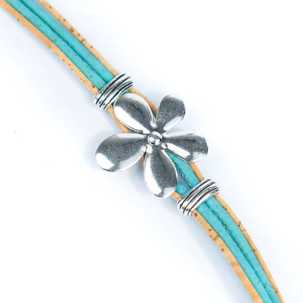 Closeup of cork bracelet with flower pendant