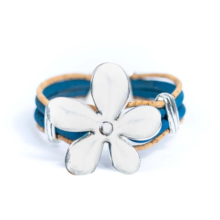 Front of blue cork bracelet with flower pendant