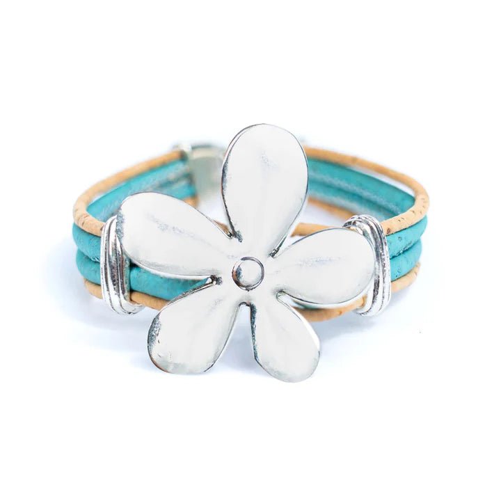 Front of light blue cork bracelet with flower pendant