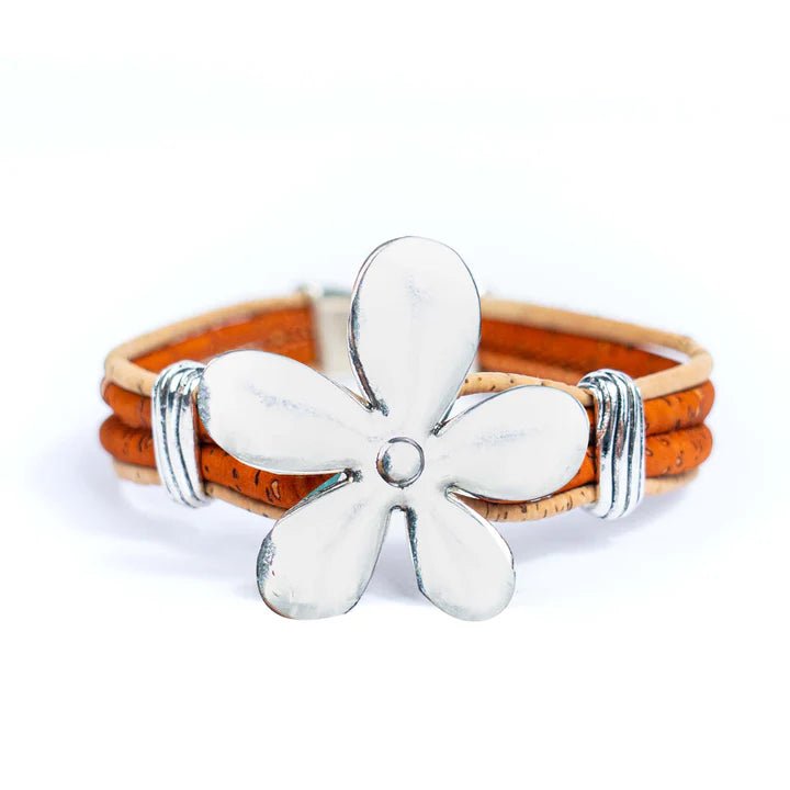 Front of orange cork bracelet with flower pendant