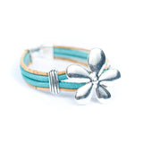 Side of cork bracelet with flower pendant