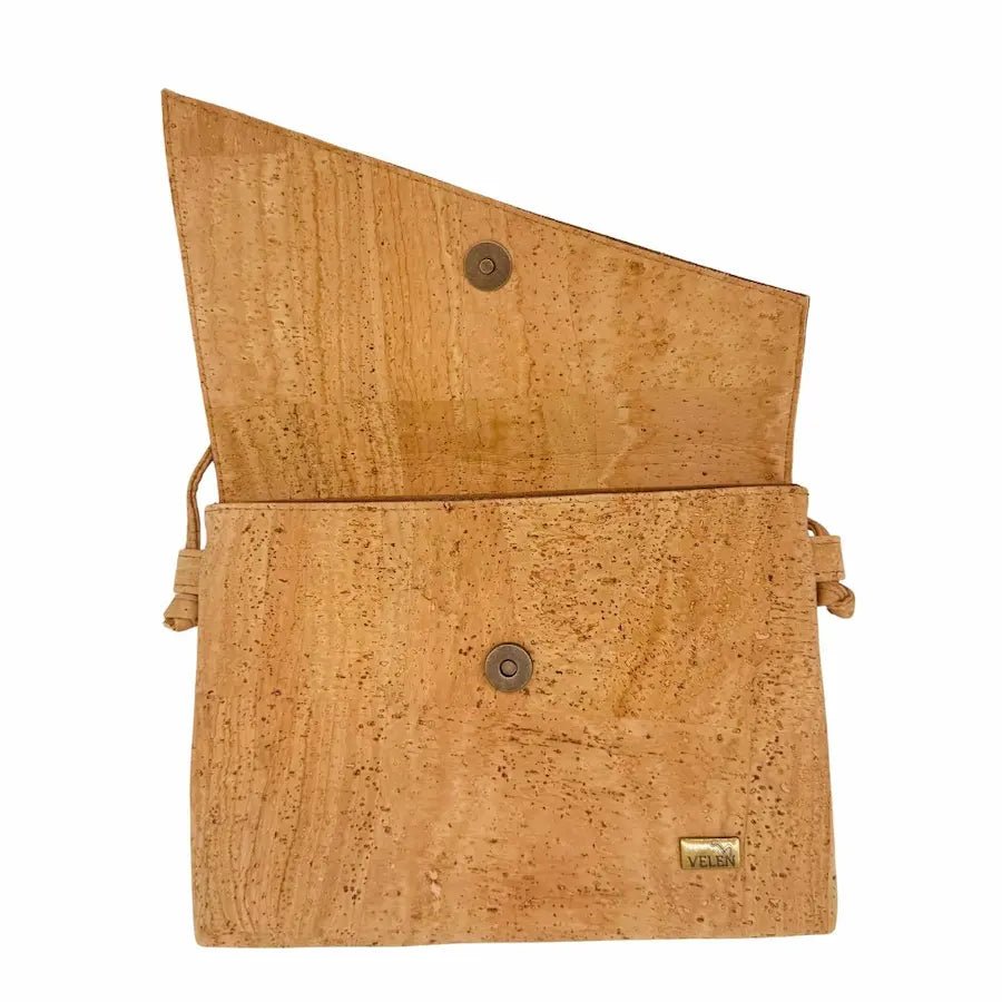 Atlanta cork messenger bag with open flap showing snap closure