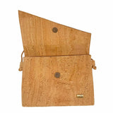 Atlanta cork messenger bag with open flap showing snap closure