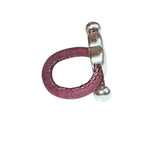 Silver heart charm purple cork ring side view on a white background