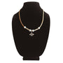 Whimsical bee charm cork necklace on jewelry bust made with natural cork cord