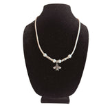 Whimsical bee charm cork necklace on jewelry bust made with white cork cord