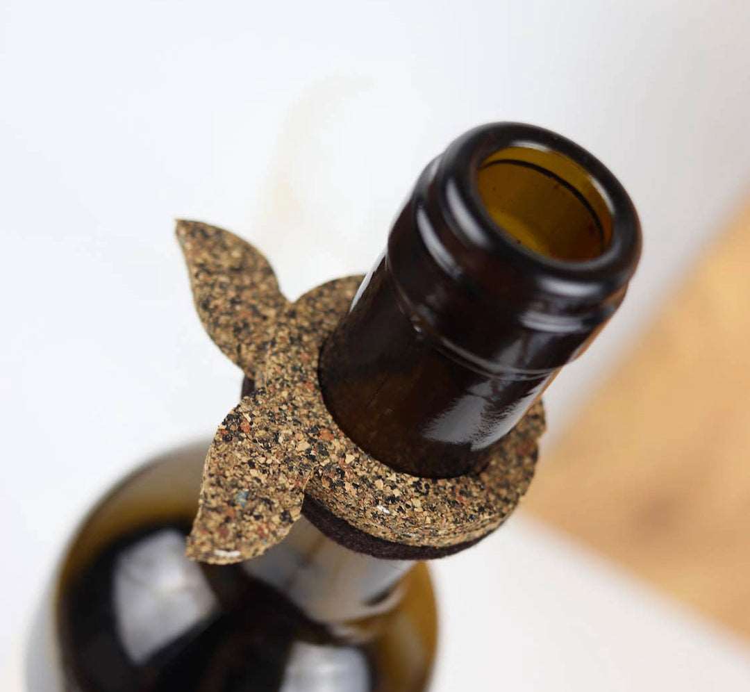 Cork Wine Bottle Drip Stop & Magnet -shown around bottle neck - Texas Cork Company