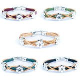 Set of five cork bracelets with daisy charms on a white background
