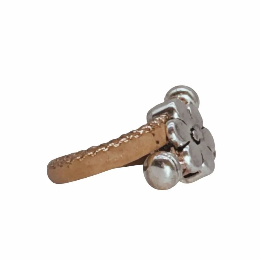 Side view of natural cork cord ring with Daisy charm