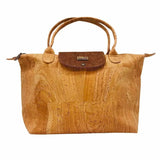 Front view of the foldable vegan cork tote bag showing cork texture and sturdy handles in Brown Gold