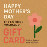 Mother's Day Gift Card with pink flower on cork background