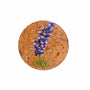 Round cork coaster with handpainted bluebonnet flower on a white background