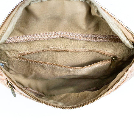 Inside main compartment of cork sling bag fanny pack from Texas Cork Company