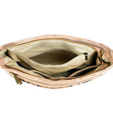 Inside pockets of three-line zipper cork crossbody bag from Texas Cork Company