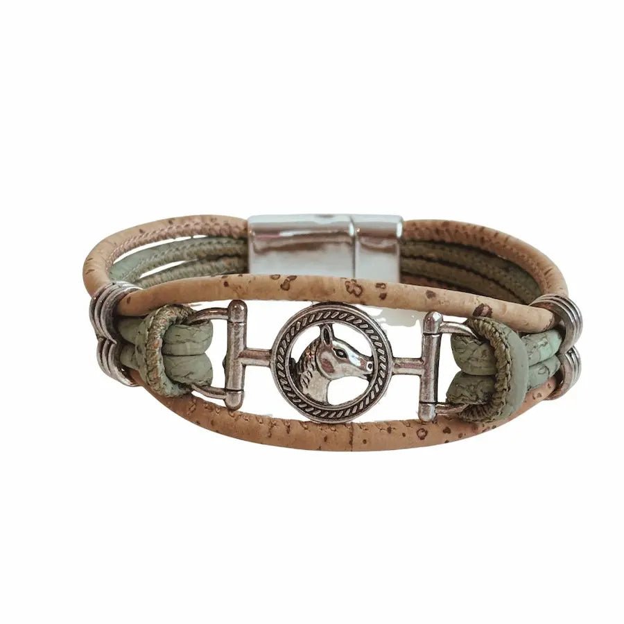 Bracelet with cork cord featuring a horse head charm on a white background