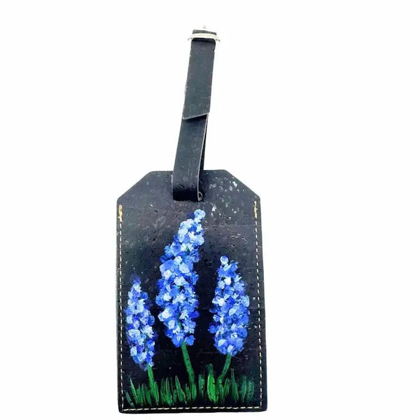 Luggage tag with bluebonnets design on a white background