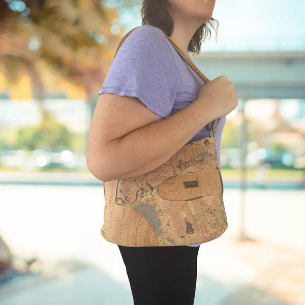 Madison mid-sized crossbody with shortened strap on woman