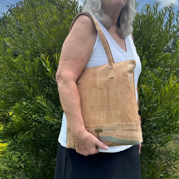 Woman holding Malibu Market Bag in Earth Sea