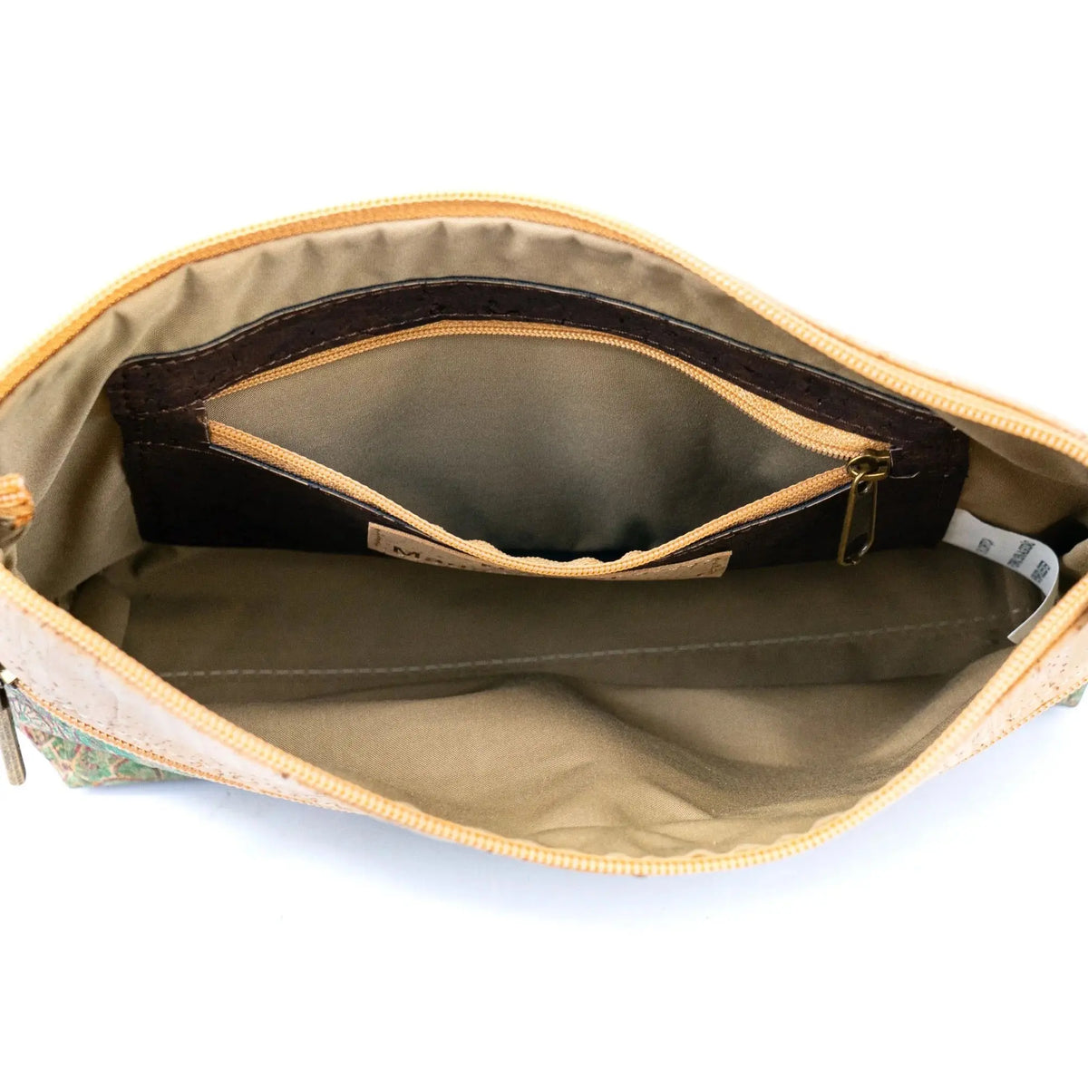 Interior zip pocket and storage compartments of Newark Cork Crossbody Bag