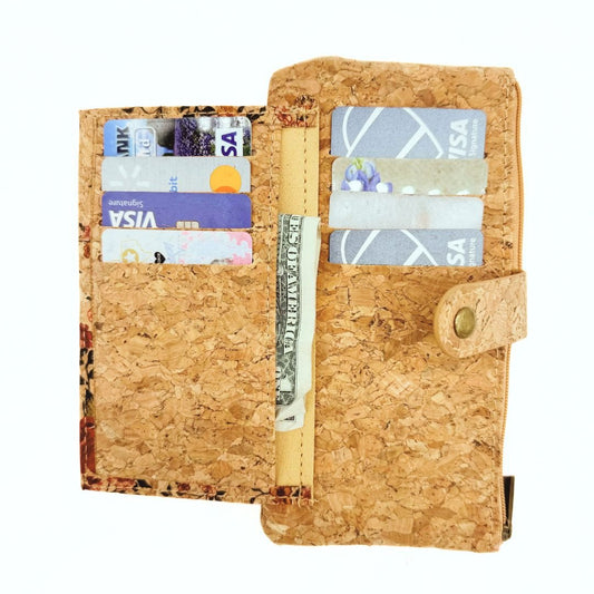 Slim cork card wallet with cards and money in the interior from Texas Cork Co