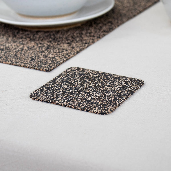 Square Dash Cork Coasters next to DASH placemats from Texas Cork Company
