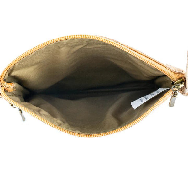 Inside of the Summerville Cork Crossbody bag on a white background.