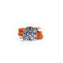 Orange ring with a silver vintage floral charm on a white background