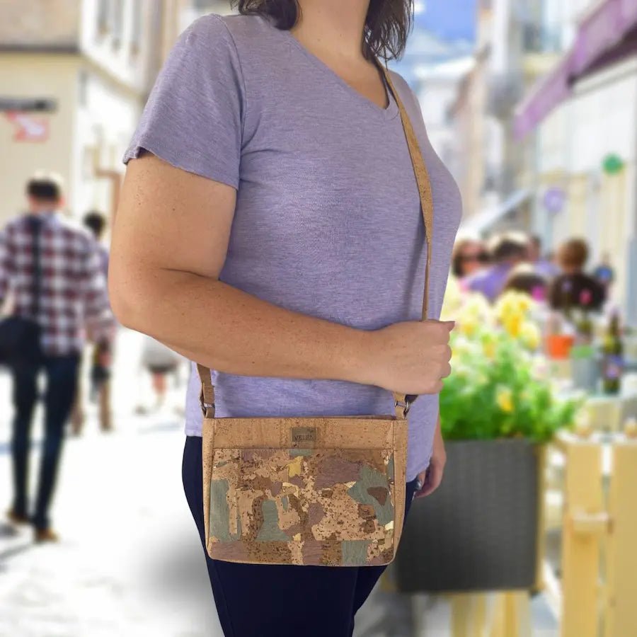  Woman wearing the Lexington cork crossbody with front slip pocket 