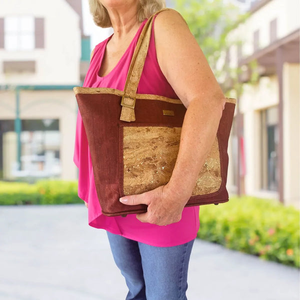 Woman wearing the Denver large cork tote