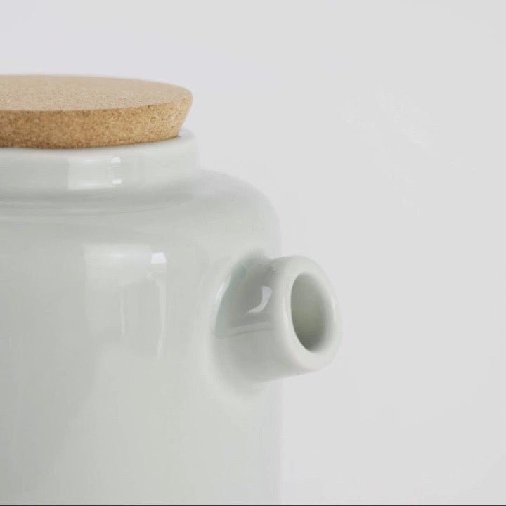 Close up of Ceramic tea pot spout and cork stopper on top -EW-SET-TEA2-CM - Texas Cork Company
