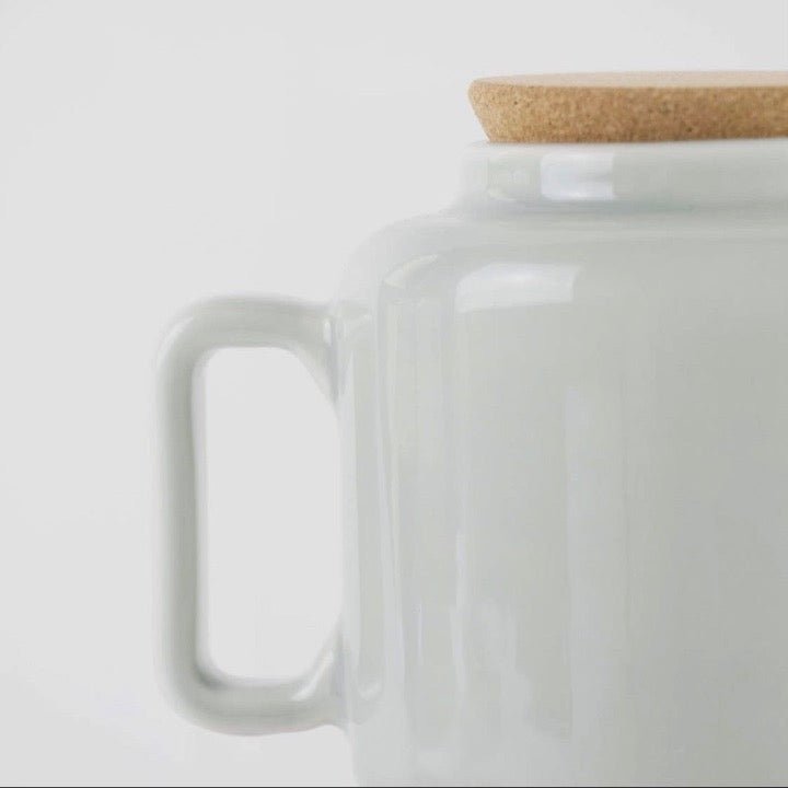 Close up of tea pot handle and cork stopper on top -EW-SET-TEA2-CM - Texas Cork Company